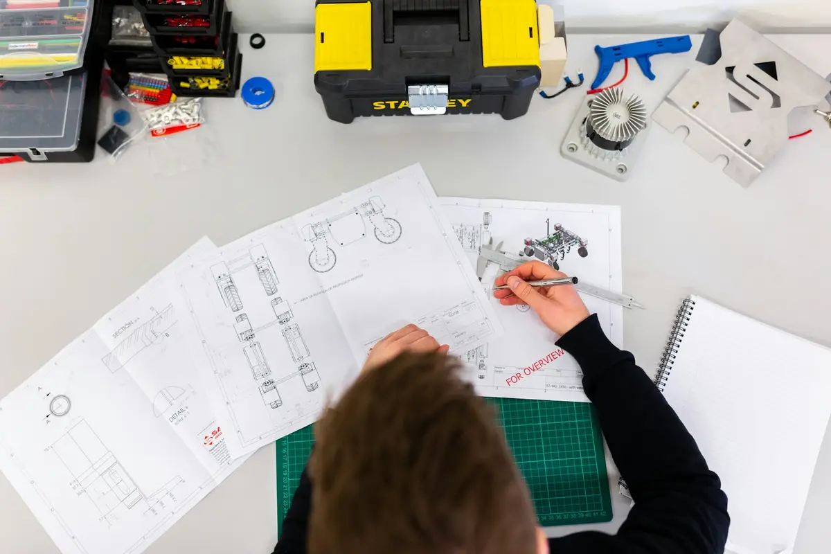 Plans et maquettes en cours de préparation pour l'impression